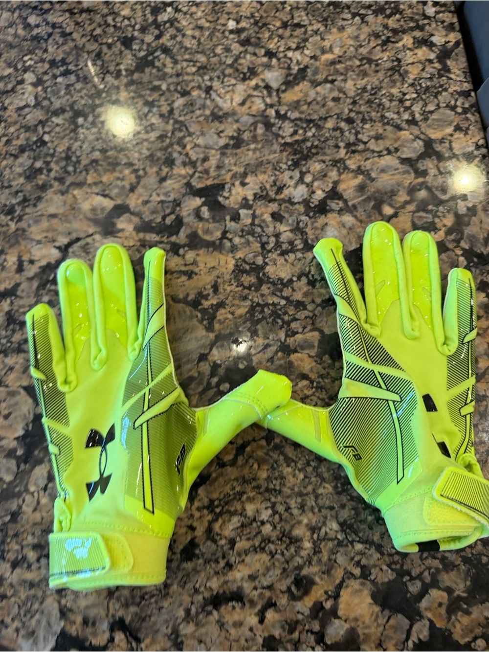 Under Armour kids football gloves